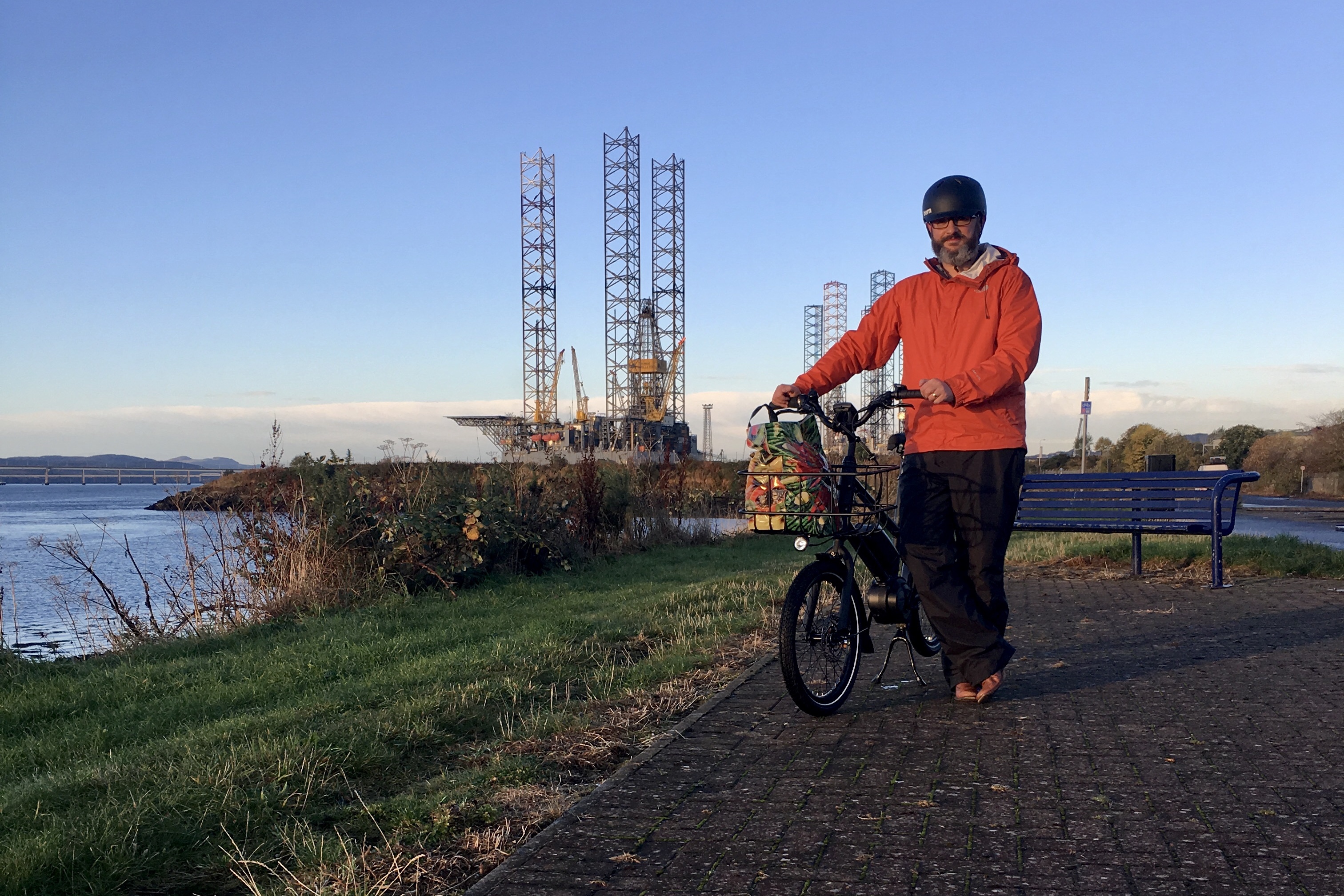 The writer standing beside his e-bike on the cycle path between Dundee and Broughty Ferry